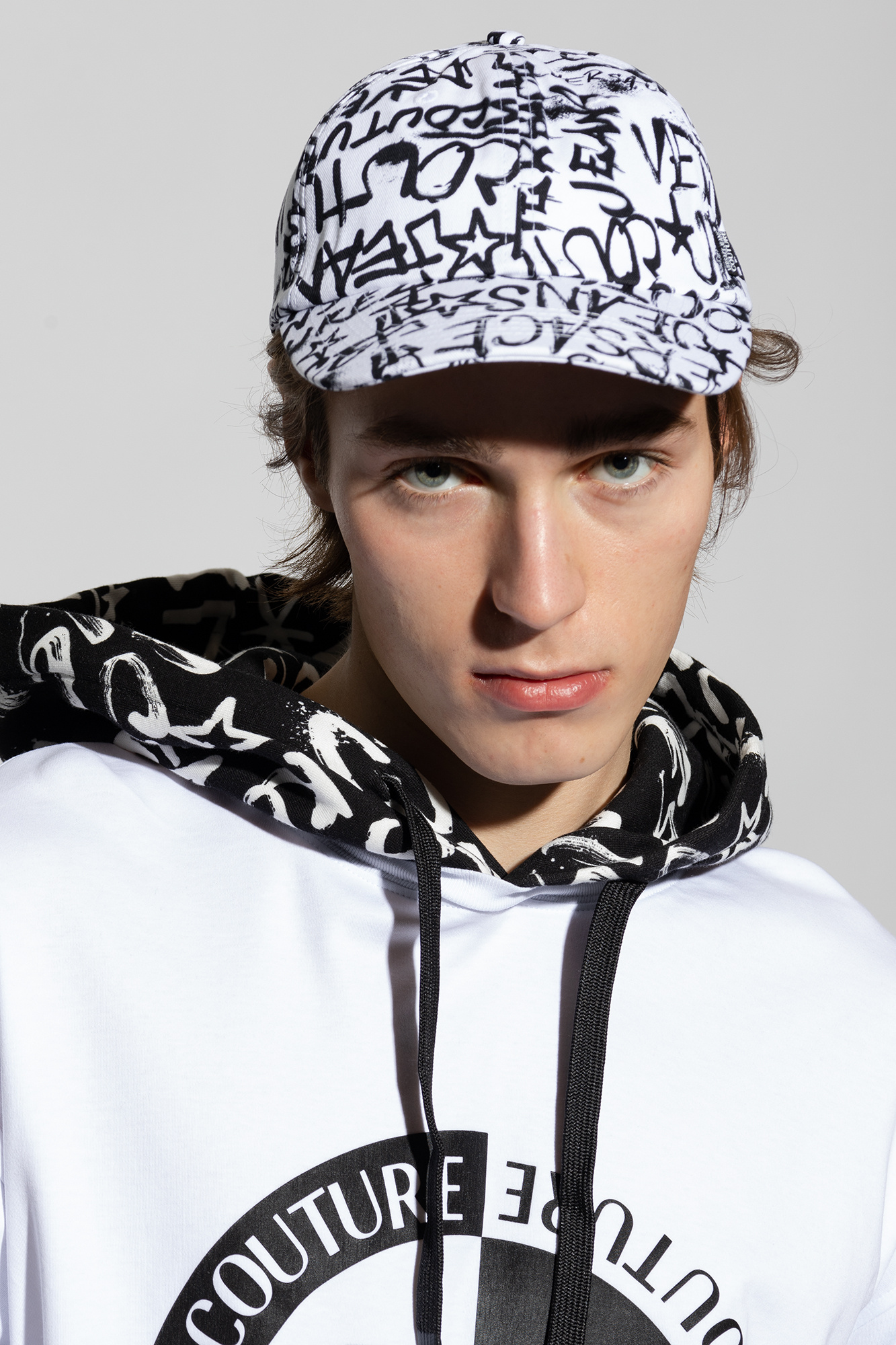 white-baseball-cap-versace-jeans-couture-vitkac-gb